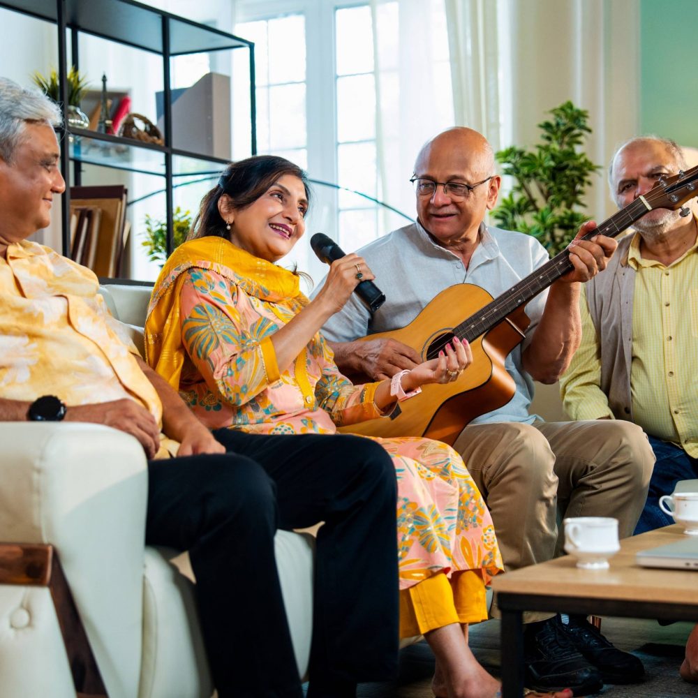 senior-group-performing-music-indoors-with-guitar-2026-01-09-10-59-40-utc
